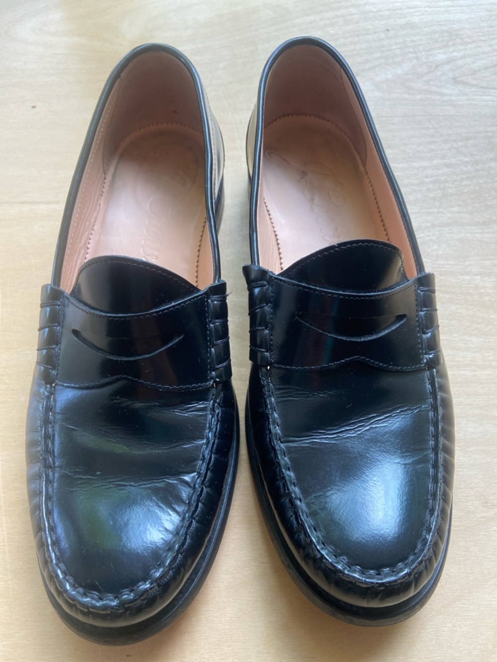 Black Winona Penny Loafers
Italian spazzolato leather - 10